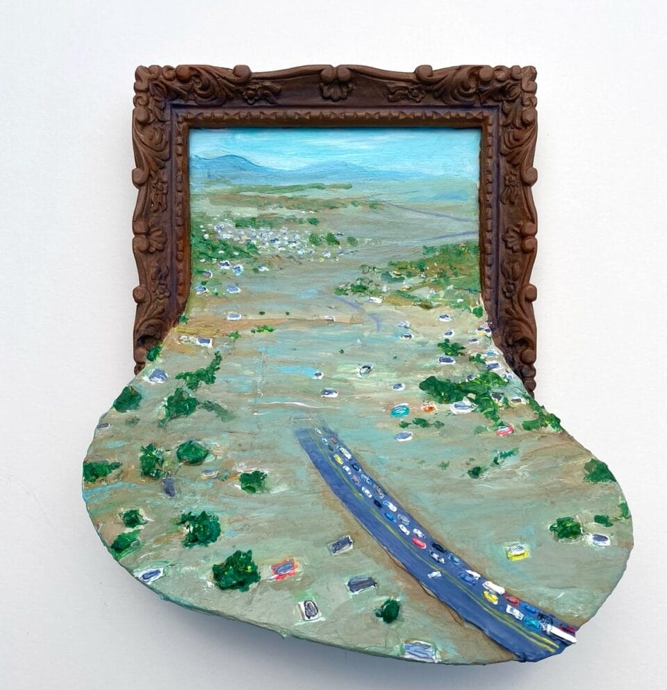 a miniature painting depicting a flooded landscape spilling out of the ornate frame