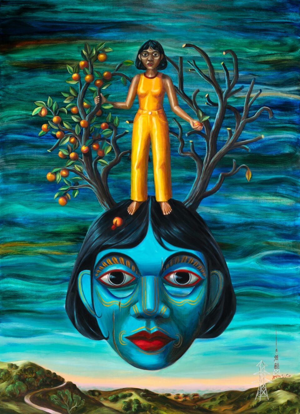 a figure in yellow stands atop a giant blue head floating in the sky. she holds onto trees, one full of fruit and the other barren