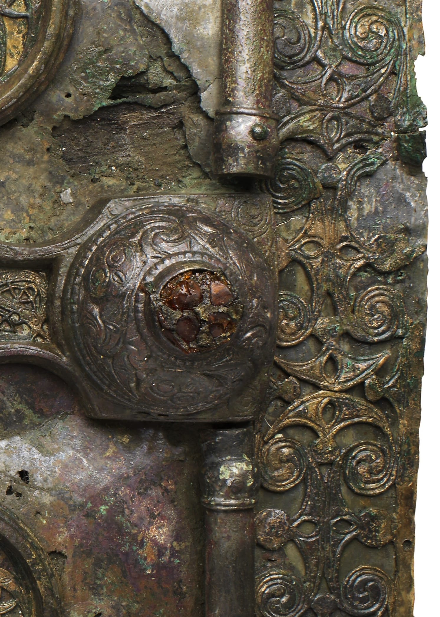 a detail of a highly decorated medieval metal book shrine