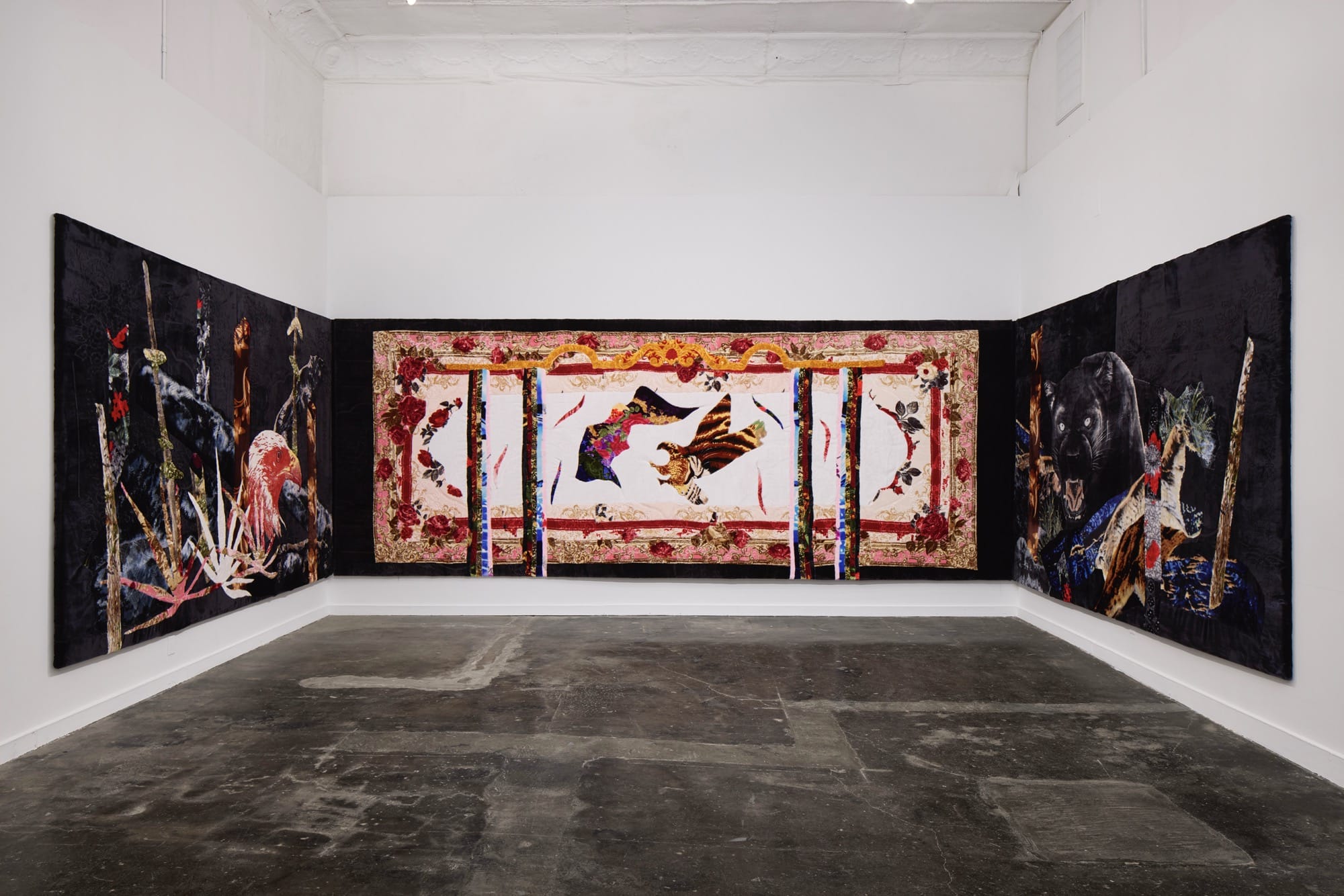 a large-scale artwork installed at Ballroom Marfa, with three panels that wrap around the corners of the space