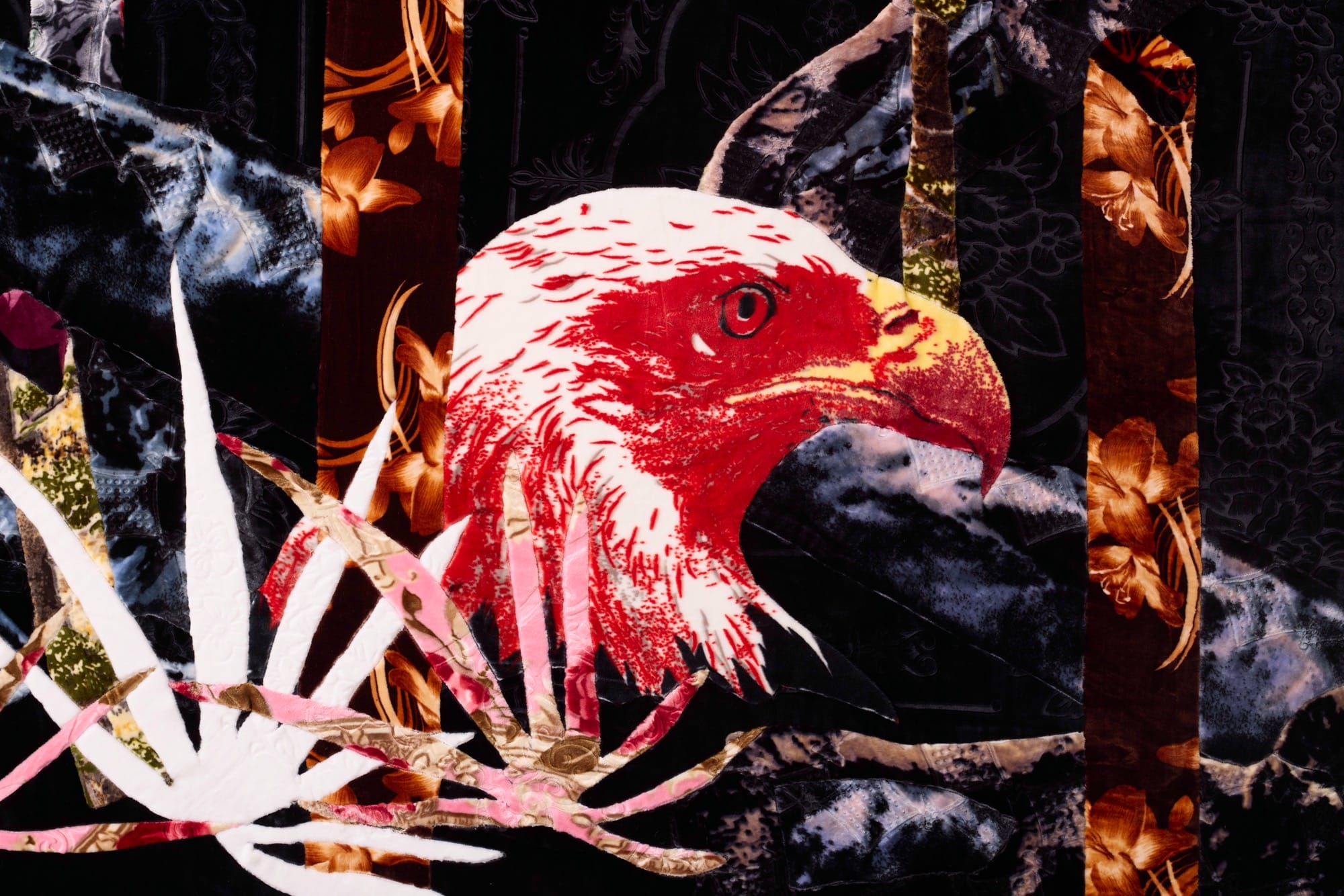 a detail of a large-scale artwork featuring the head of a bald eagle