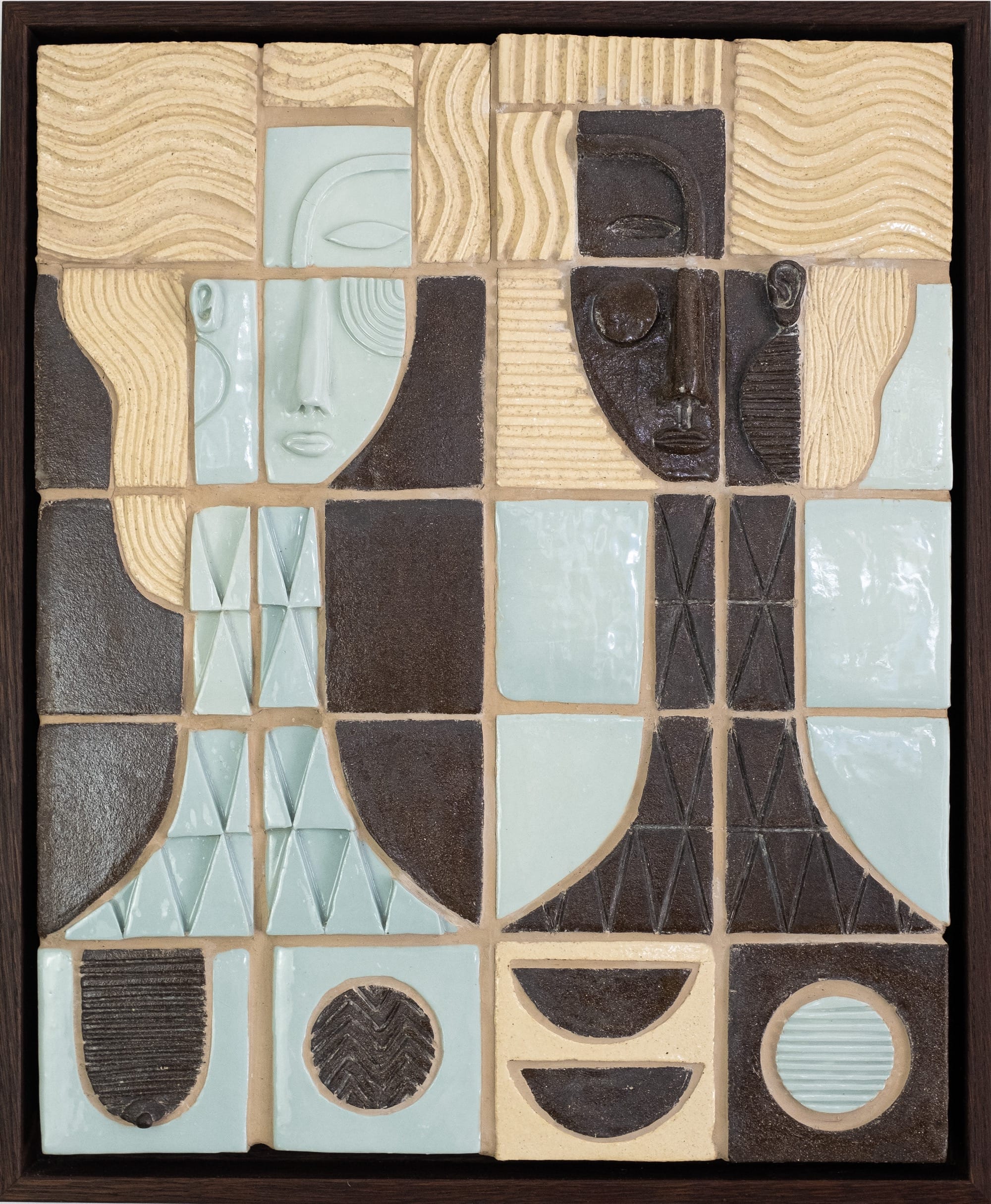 an abstract tile composition of two women in a wooden frame