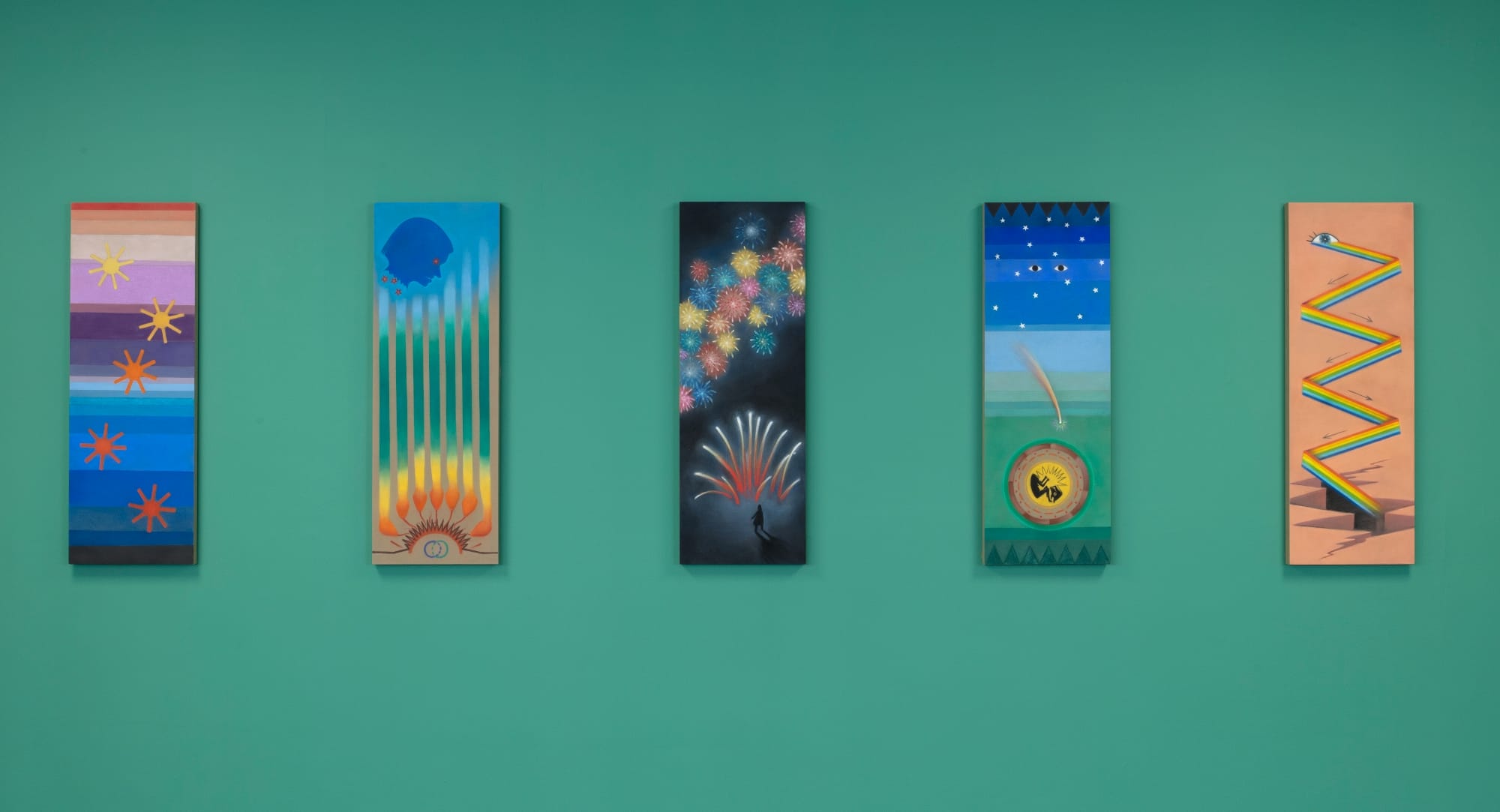 five tall cosmic paintings on a green backdrop