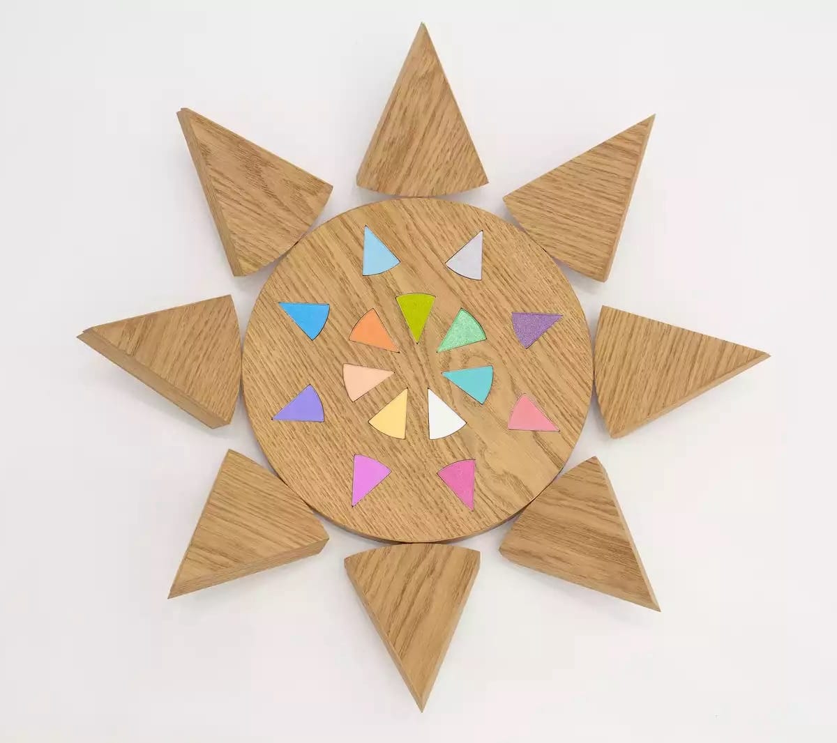 a wooden star work with eyeshadow palettes embedded